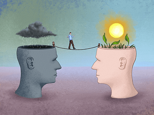 Image of a person walking between a stormy mind and a sunny mind
